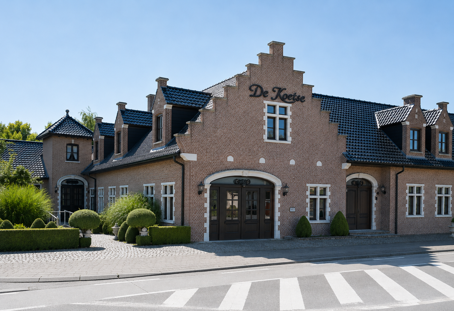Het gebouw van feestzaal De Koetse in Kluisbergen